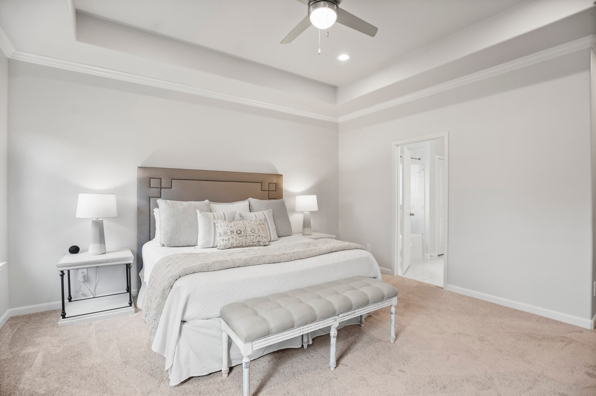 monochromatic primary bedroom in Conroe Texas