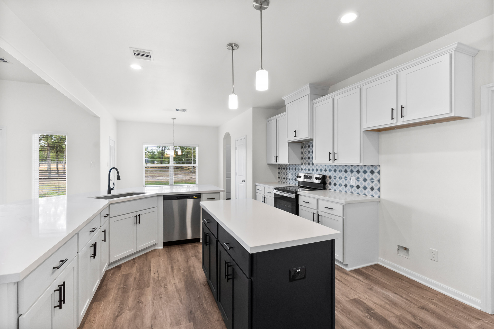 white kitchen with two tone island in Conroe Texas