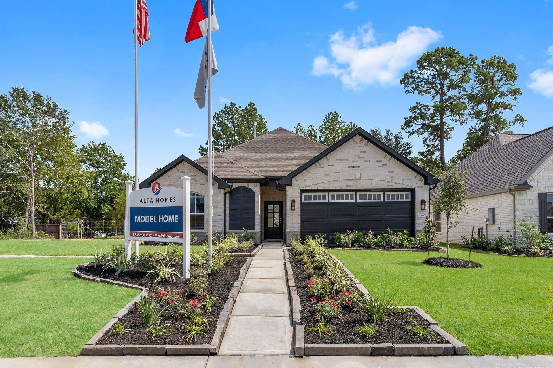 Lexington Heights model home exterior by Alta Homes in Willis Texas