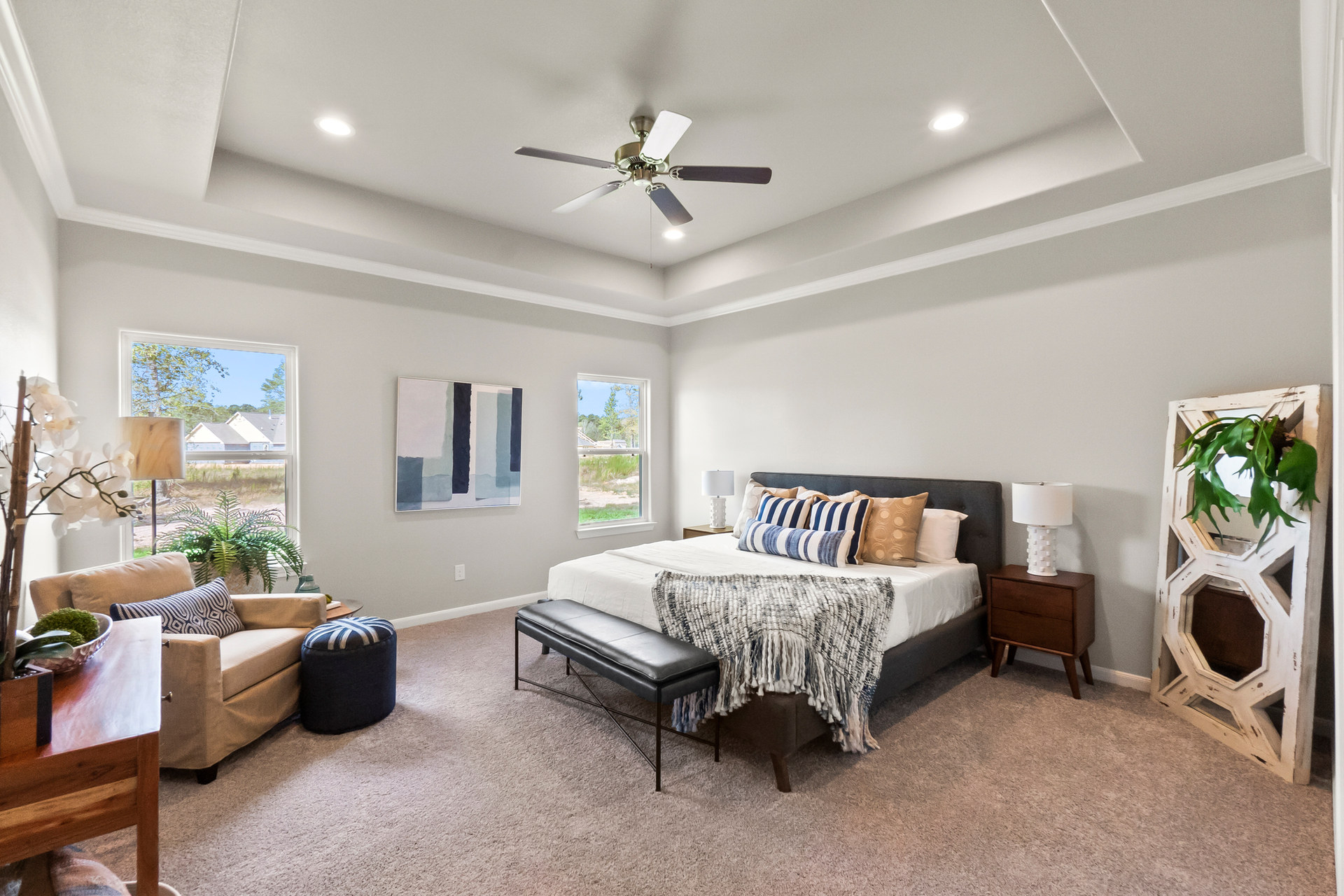 new construction primary bedroom with tray ceiling